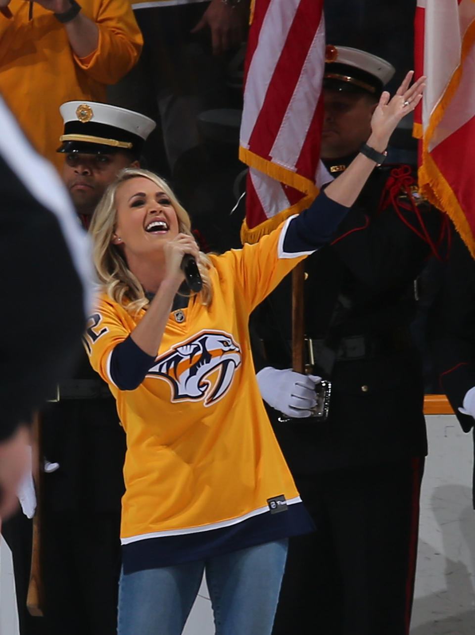 Carrie Underwood sings the national anthem prior to Game 2 between the Nashville Predators and the Winnipeg Jets in the Stanley Cup playoffs at Bridgestone Arena on April 29 in Nashville. (Photo: Frederick Breedon/Getty Images)