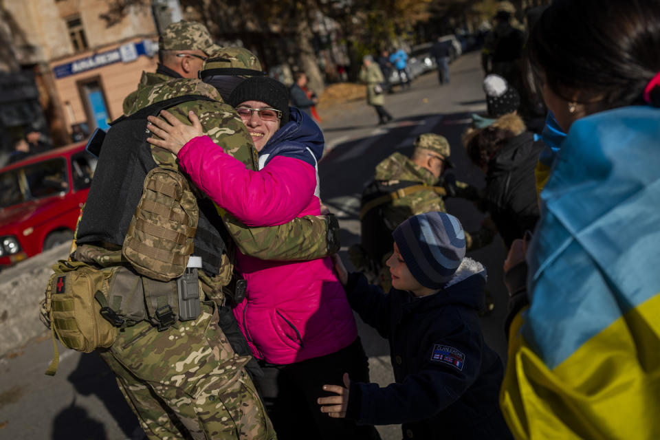 A Kherson resident hugs a Ukrainian defence force member in Kherson, southern Ukraine, Monday, Nov. 14, 2022. The retaking of Kherson was one of Ukraine&#39;s biggest successes in the nearly nine months since Moscow&#39;s invasion. (AP Photo/Bernat Armangue)