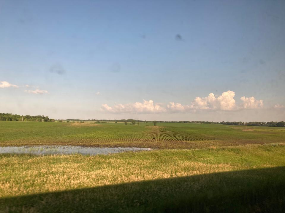 Blue skies looking down on miles of farmland is a common scene aboard Amtrak's Empire Builder.