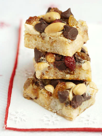 Five-layer bars only sound complicated, promise. Start with store-bought macaroons and pile them high with chocolate, cranberries and nuts.