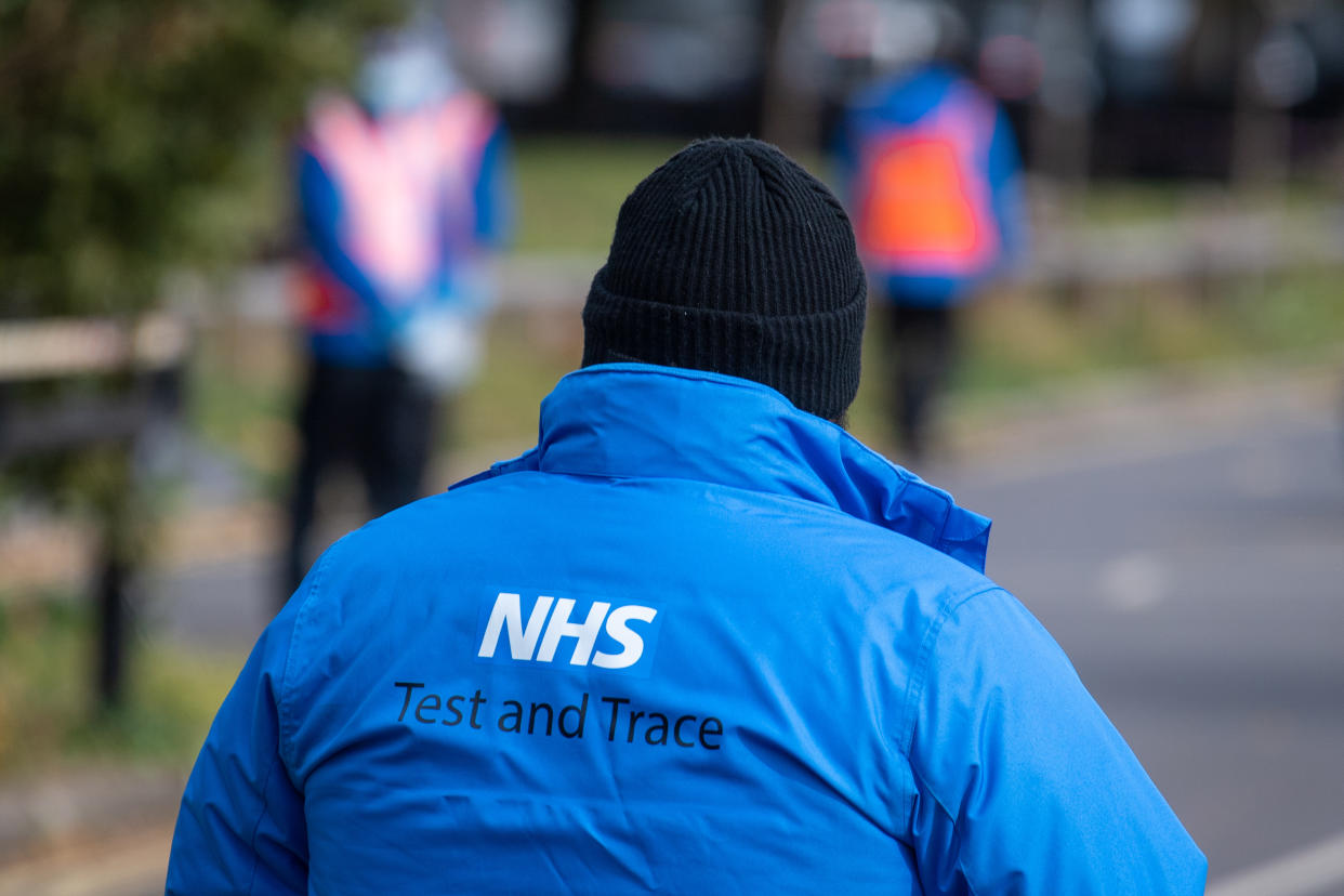 An NHS Test and Trace logo on a member of staff's jacket at a Covid-19 testing centre in Southwark, south London, after a range of new restrictions to combat the rise in coronavirus cases came into place in England. (Photo by Dominic Lipinski/PA Images via Getty Images)