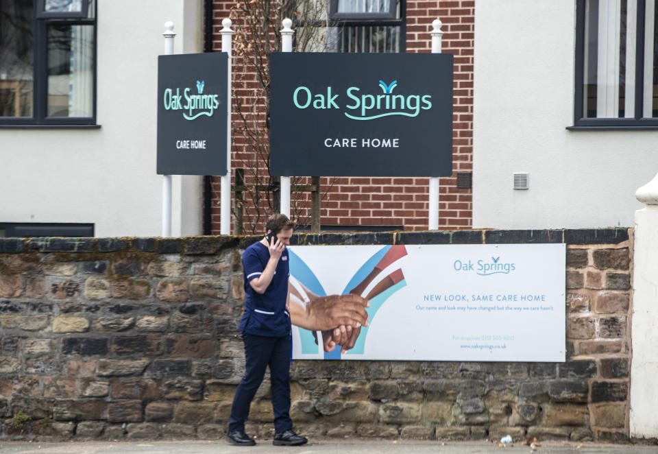 A member of staff outside The Oak Springs care home in Wavertree, Liverpool, which was operating with a quarter of its usual staff numbers due to Covid-19, according to Labour MP Paula Barker.