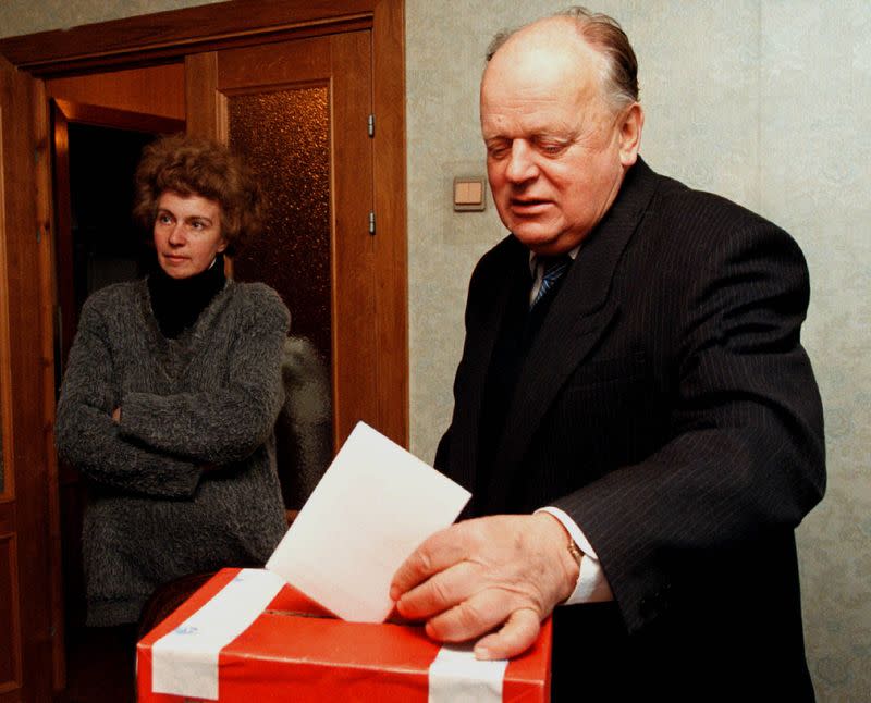 FILE PHOTO: Former speaker of Belarussian parliament Stanislav Shushkevich drops his voting ballot in a box