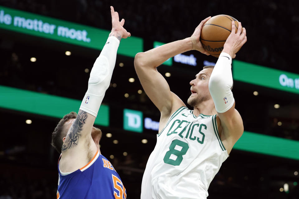Boston Celtics center Kristaps Porzingis leads a team that is a heavy favorite to win the Eastern Conference.  (Photo by Danielle Parhizkaran/The Boston Globe via Getty Images)