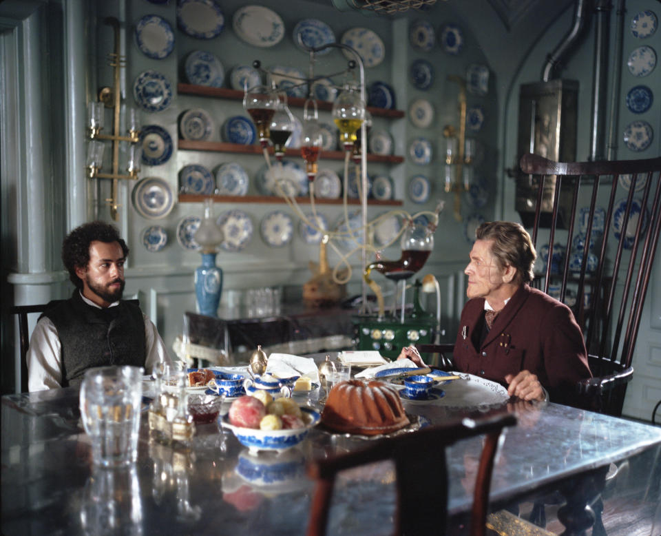 Ramy Youssef and Willem Dafoe in POOR THINGS. Photo by Yorgos Lanthimos. Courtesy of Searchlight Pictures.© 2023 20th Century Studios All Rights Reserved.