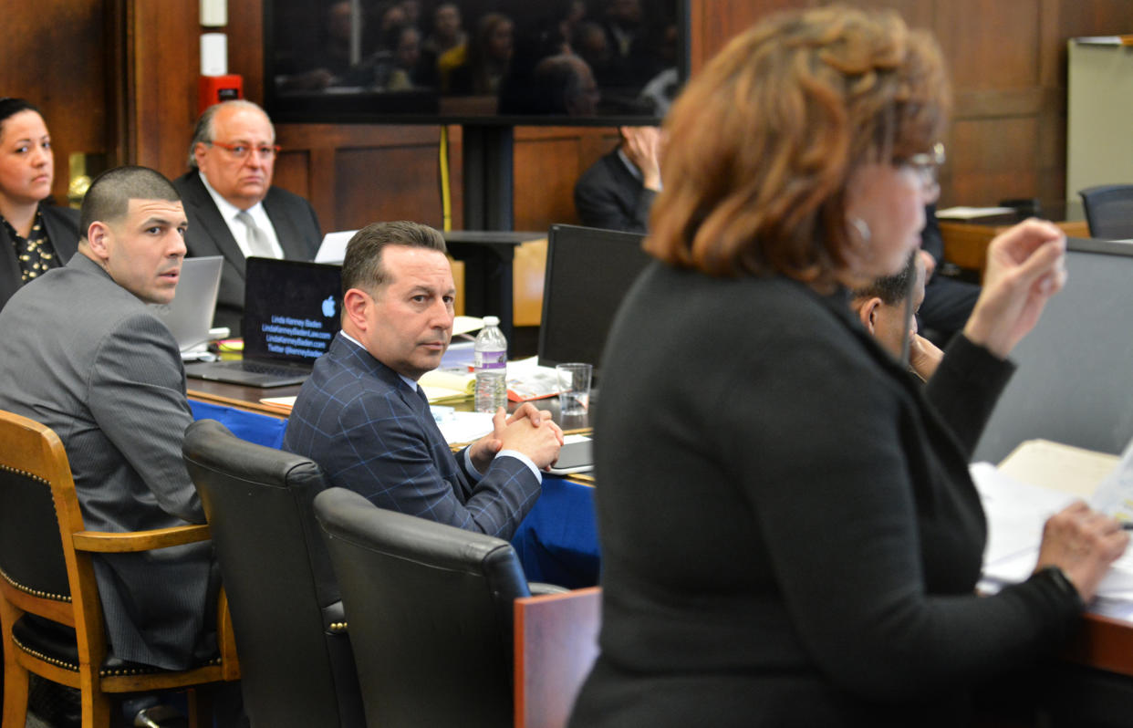 (Boston, Ma 031317) Aaron Hernandez (L) and defense attorney Jose Baez, listen to defense attorney Linda Kenney Baden (R) question a ballistics expert during Hernandez's double murder trial for the July 2012 killings of Daniel de Abreu and Safiro Furtado in Boston. March 13, 2017 Staff photo Chris Christo (Photo by Chris Christo/MediaNews Group/Boston Herald via Getty Images)