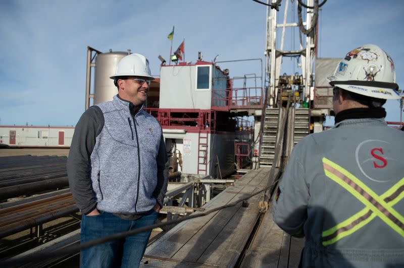 Royal Helium's CEO Davidson talks to crew at Climax 1 drill site in Lone Tree