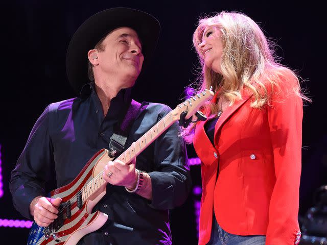 <p>Rick Diamond/Getty</p> Clint Black and actress Lisa Hartman Black perform onstage during 2016 CMA Festival on June 10, 2016 in Nashville, Tennessee.