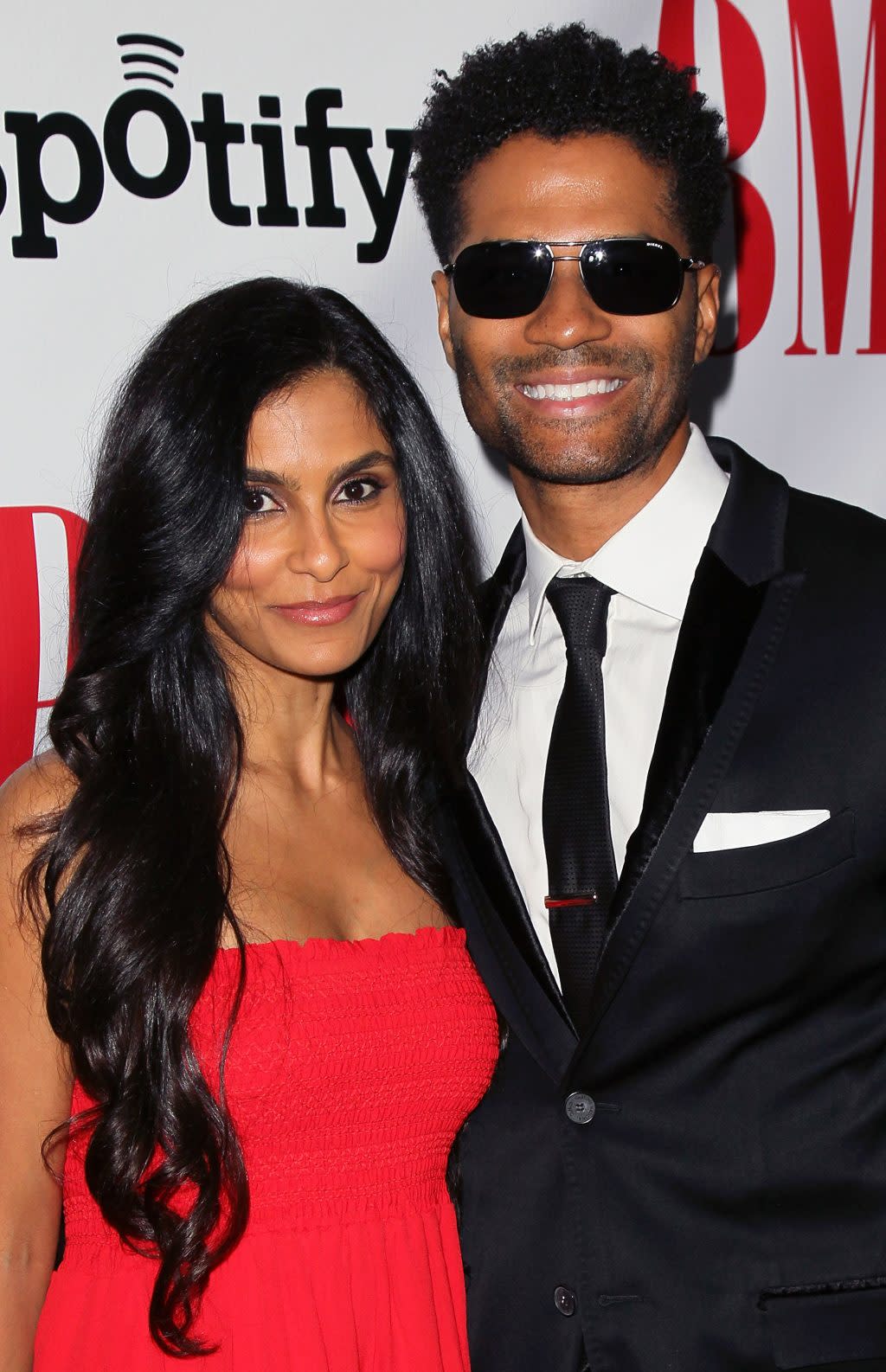 Singer Eric Benet (R) and wife Manuela Testolini attends the 12th Annual BMI Urban Awards at the Saban Theatre on September 7, 2012 in Beverly Hills, California. (Photo by David Livingston/Getty Images)