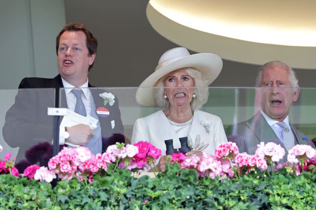 <p>Chris Jackson/Getty</p> Tom Parker Bowles, Queen Camilla and King Charles intently watch the 2023 Royal Ascot.