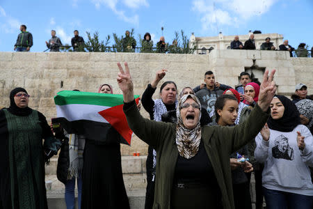 Palestinians shout slogans during a protest following U.S. President Donald Trump's announcement that he has recognized Jerusalem as Israel's capital, near Damascus Gate in Jerusalem's Old City December 7, 2017. REUTERS/Ammar Awad