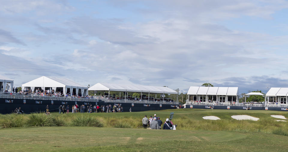 A threesome heads toward the 16th green during the second round of the Houston Open golf tournament in Humble, Texas, Friday, Oct. 11, 2019. (Wilf Thorne/Houston Chronicle via AP)