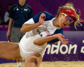 US April Ross looks at the ball during the women's beach volleyball preliminary phase Pool B match against The Netherland's Marleen van Iersel and Sanne Keizer on The Centre Court Stadium at Horse Guards Parade in London on July 31, 2012, during the London 2012 Olympic Games. USA won 2-1 AFP PHOTO / DANIEL GARCIADANIEL GARCIA/AFP/GettyImages