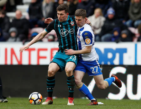 Soccer Football - FA Cup Quarter Final - Wigan Athletic vs Southampton - DW Stadium, Wigan, Britain - March 18, 2018 Southampton's Pierre-Emile Hojbjerg in action with Wigan Athletic’s Ryan Colcough Action Images via Reuters/Jason Cairnduff