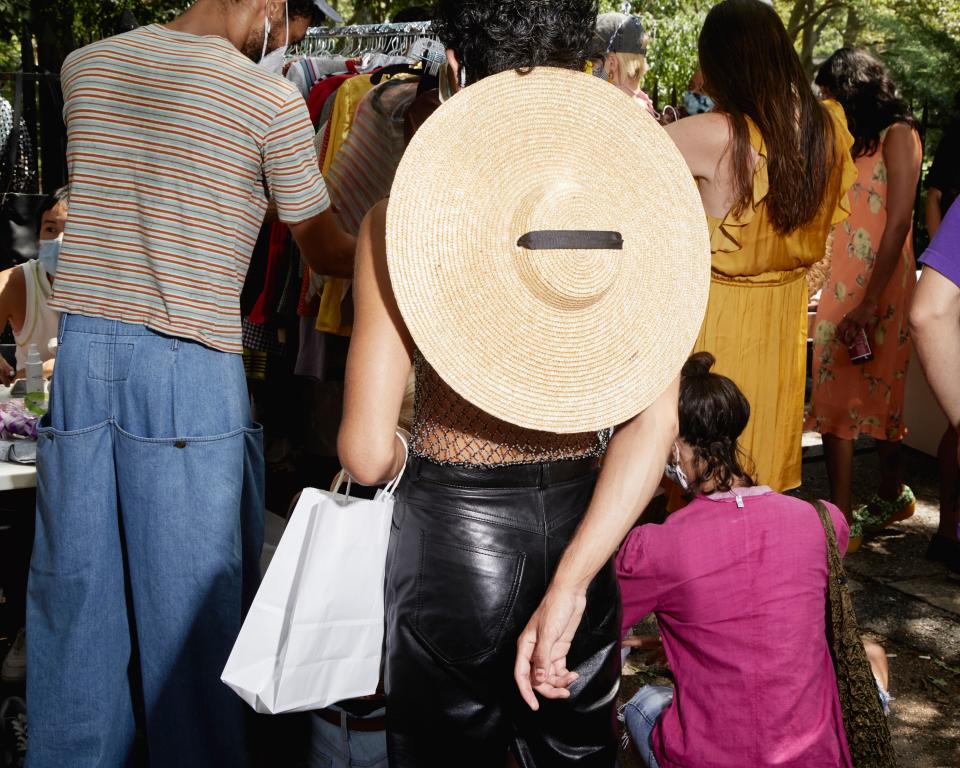 Brooklyn, NY - August 9, 2020Attendees peruse vintage clothing for sale at the "Black Lives Matter Sidewalk Sale", a fundraising event that has taken place at on Sundays at McGolrick Park since early June.