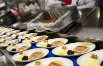 Meals for Lufthansa's first class passengers are prepared by employees of LSG Group, Lufthansa's airline catering division, at the LSG headquarters in Frankfurt, Germany, November 11, 2016. REUTERS/Kai Pfaffenbach