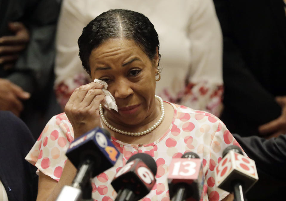 Lisa Berry wipes a tear during a news conference regarding the July 19 duck boat accident, Tuesday, July 31, 2018, in Indianapolis. A second lawsuit has been filed by members of her family who lost nine relatives when the boat sank near Branson, Mo., killing 17 people. (AP Photo/Darron Cummings)
