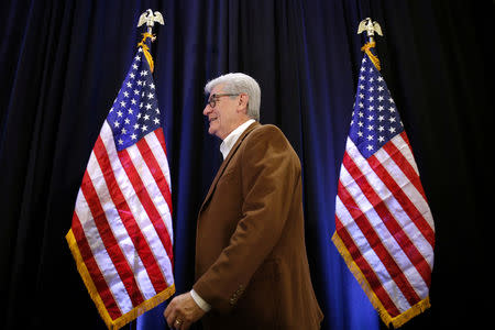 FILE PHOTO: Phil Bryant, governor of Mississippi, takes to the stage during an election night party for Republican U.S. Senator Cindy Hyde-Smith in Jackson, Mississippi, U.S., November 27, 2018. REUTERS/Jonathan Bachman/File Photo