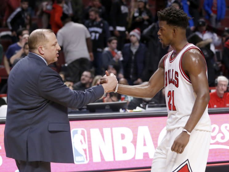 Tom Thibodeau and Jimmy Butler share a moment before the game. (Associated Press)