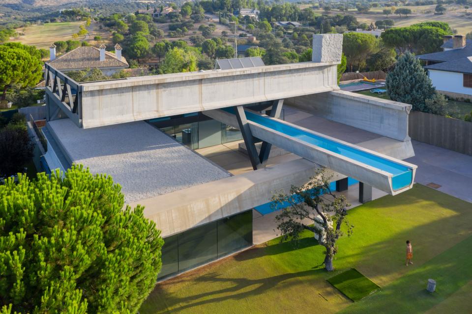 The 2008 Hemeroscopium house, designed by the architects as their own home, repurposes concrete channels used for highways and irrigation systems.