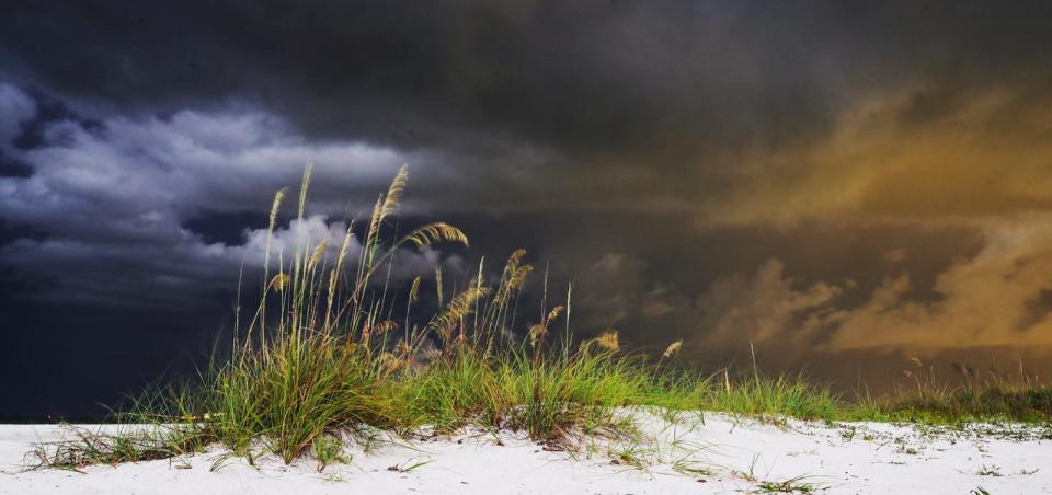 A lightning storm lights up Southwest Florida on Thursday, July 25, 2020. Different types of lightning were observed and photographed including some cases of spider lightning. Photographed from Bowditch Point Park on Fort Myers Beach. Photographed with a Canon 1Dx Mark II set at ISO 500 at 13-15 seconds on a tripod at aperture f/8. This image is lit from lightning from behind the photographer.