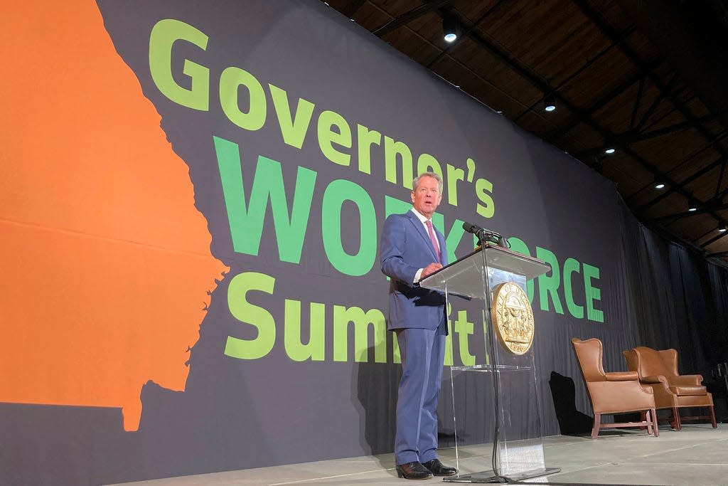 Georgia Gov. Brian Kemp speaks at a workforce summit, Thursday, Oct. 5, 2023, in downtown Atlanta. Kemp announced a program to streamline college admissions and encourage more students to attend college. (AP Photo/Jeff Amy)