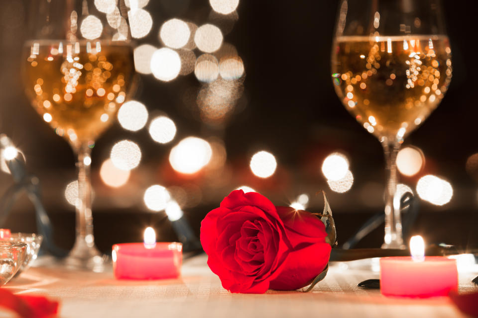 Romantic candlelight dinner in luxury restaurant.