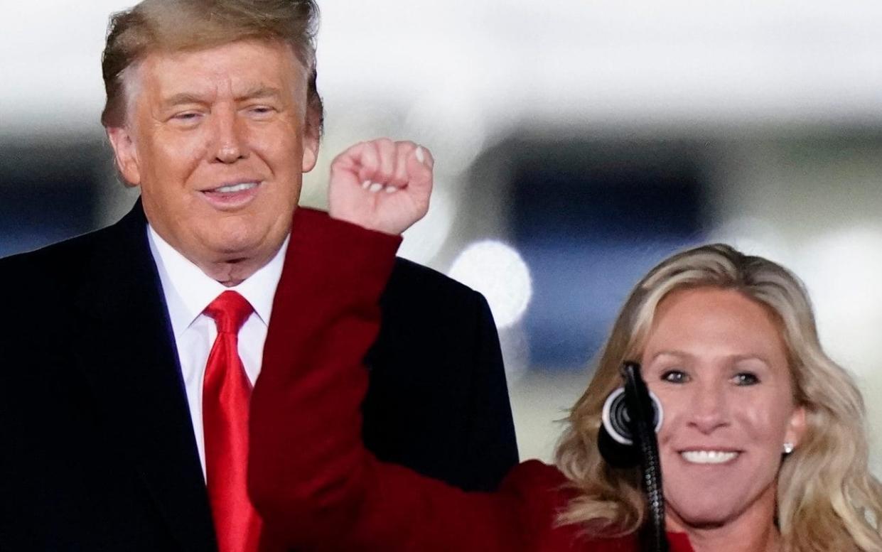 Marjorie Taylor Greene with Donald Trump at a campaign rally in Dalton, Georgia