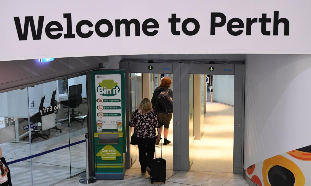<span>Passengers at Perth airport posted on social media that planes had begun taking off by late Saturday morning.</span><span>Photograph: James D Morgan/Getty Images</span>