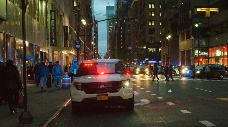 MTA Police vehicles parked along Lexington Avenue with emergency lights activated signal for traffic to stop for a random inspection by K-9 patrolmen and their bomb-sniffing dogs. - Photo: Albin Lohr-Jones/Pacific Press/LightRocket (Getty Images)