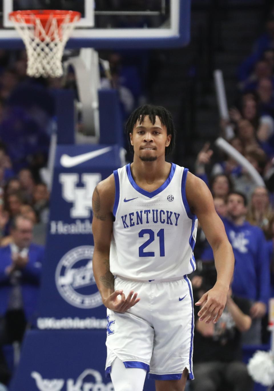 Kentucky's guard D.J. Wagner (21) celebrates making a three against Vanderbilt during the first half of an NCAA basketball game at Rupp Arena in Lexington, Ky., Wednesday, Mar. 6, 2024