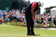 MELBOURNE, AUSTRALIA - NOVEMBER 20: Phil Mickelson of the U.S. Team putts on the fourth hole during the Day Four Singles Matches of the 2011 Presidents Cup at Royal Melbourne Golf Course on November 20, 2011 in Melbourne, Australia. (Photo by Mark Dadswell/Getty Images)