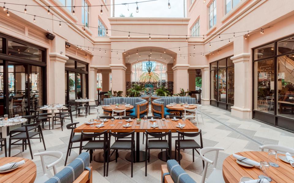 In addition to a large indoor dining area and a VIP area for special events, American Social Bar & Kitchen at Mizner Park has a courtyard area for dining and drinks.