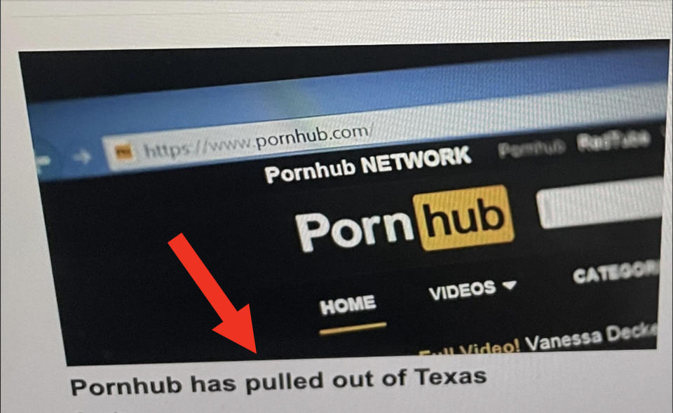 Close-up of the Pornhub website on a browser with the news headline "Pornhub has pulled out of Texas" below