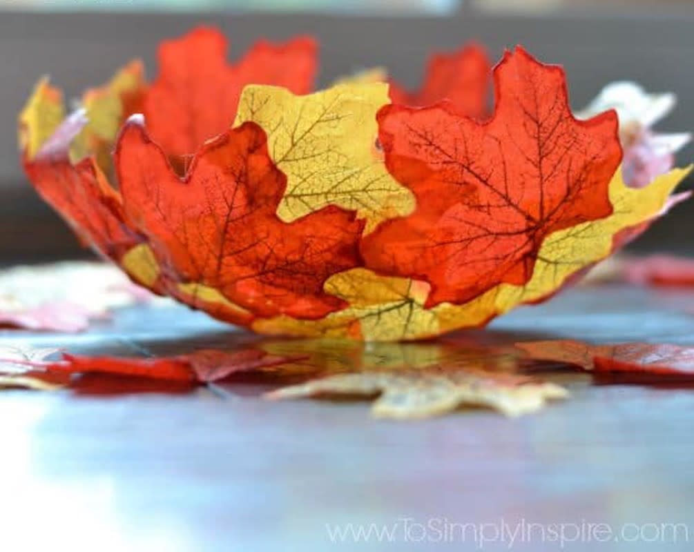 <p>To Simply Inspire</p><p>This leaf bowl by <a href="https://www.tosimplyinspire.com/diy-fall-leaf-bowl.html" rel="nofollow noopener" target="_blank" data-ylk="slk:To Simply Inspire;elm:context_link;itc:0;sec:content-canvas" class="link rapid-noclick-resp"><em>To Simply Inspire</em></a> may appear difficult to make, but it’s totally something kids can do! Plus, it’ll look so chic as part of your Thanksgiving décor.</p>