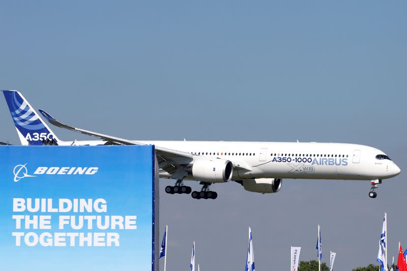 An Airbus A350-1000 performs during the inauguration of the 53rd International Paris Air Show at Le Bourget Airport near Paris