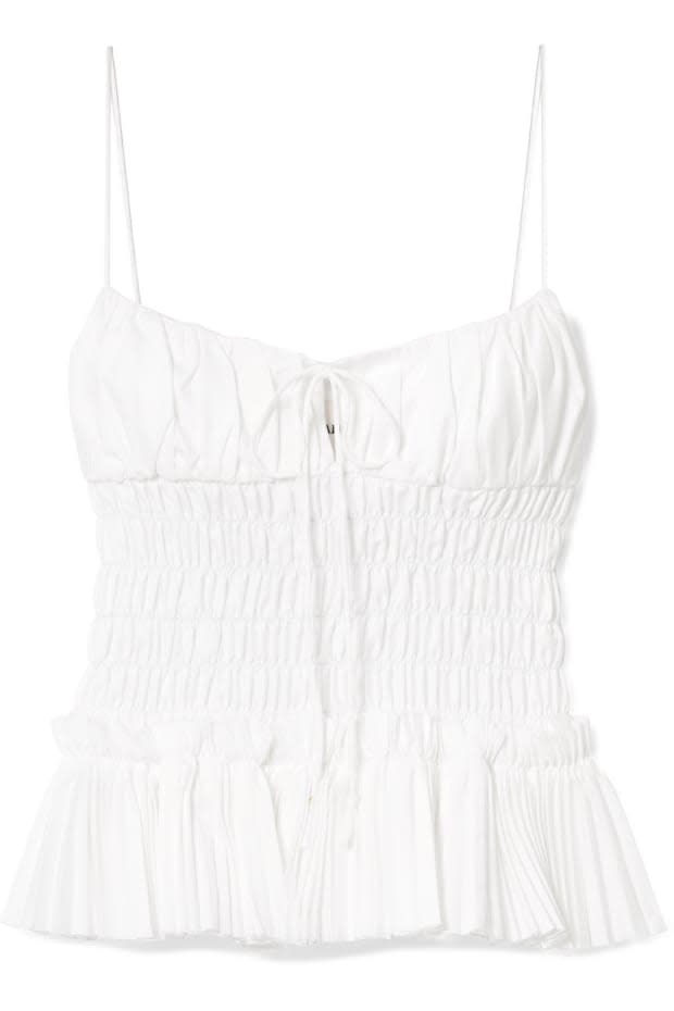<p>Khaite Dagny Shirred Pleated Cotton-Poplin Top, $468 (from $780), <a href="https://rstyle.me/+7vxshGOPDvHG7tMSmuaYoA" rel="nofollow noopener" target="_blank" data-ylk="slk:available here;elm:context_link;itc:0;sec:content-canvas" class="link ">available here</a>. </p>