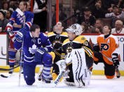 OTTAWA, ON - JANUARY 28: Dion Phaneuf #3 of the Toronto Maple Leafs and team Chara talks with Tim Thomas #30 of the Boston Bruins and Team Chara on the ice during the 2012 Molson Canadian NHL All-Star Skills Competition at Scotiabank Place on January 28, 2012 in Ottawa, Ontario, Canada. (Photo by Christian Petersen/Getty Images)