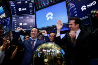 Bin Li, CEO of Chinese electric vehicle start-up NIO Inc., celebrates after ringing a bell as NIO stock begins trading on the floor of the New York Stock Exchange (NYSE) during the company’s initial public offering (IPO) at the NYSE in New York, U.S., September 12, 2018. REUTERS/Brendan McDermid