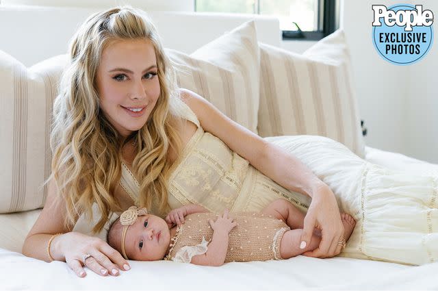 <p>Jenny Quicksall Photography</p> Tara Lipinski and baby Georgie
