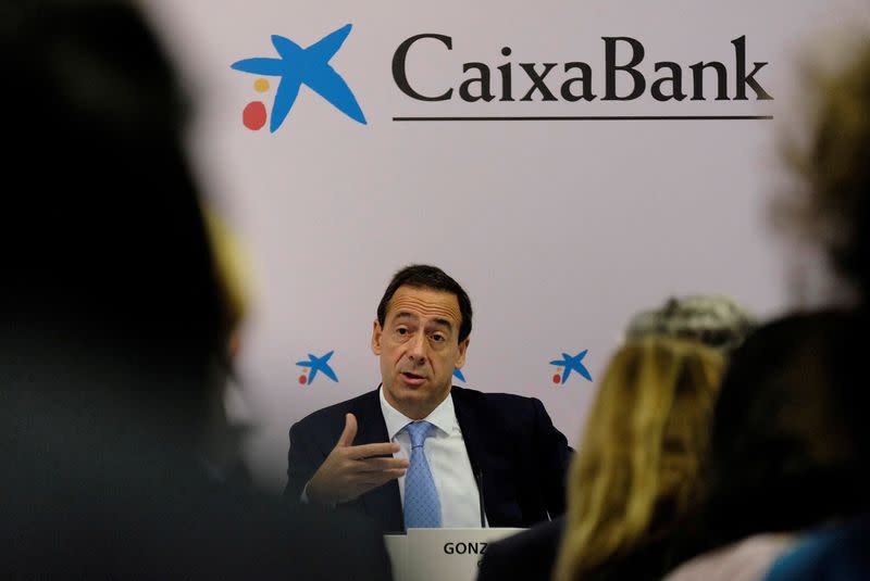 FILE PHOTO: CaixaBank's CEO Gonzalo Gortazar talks to the media during the presentation of the 2017 third quarter results in Valencia