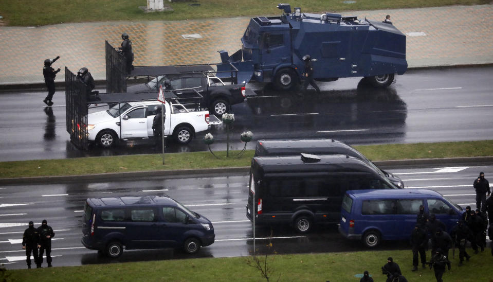 Belarusian police block a street during an opposition rally to protest the official presidential election results in Minsk, Belarus, Sunday, Oct. 11, 2020. Belarus' authoritarian president Alexander Lukashenko on Saturday visited a prison to talk to opposition activists, who have been jailed for challenging his re-election that was widely seen as manipulated and triggered two months of protests. (AP Photo)