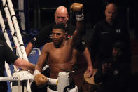 Anthony Joshua of Britain waves to spectators after his defeat to Oleksandr Usyk of Ukraine in their WBA (Super), WBO and IBF boxing title bout at the Tottenham Hotspur Stadium in London, Saturday, Sept. 25, 2021. (AP Photo/Frank Augstein)