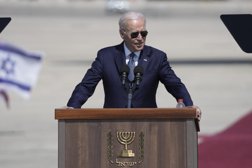 President Joe Biden speaks during a welcoming ceremony upon his arrival at Ben Gurion International Airport near Tel Aviv, Israel Wednesday, July 13, 2022. Biden arrives in Israel on Wednesday for a three-day visit, his first as president. He will meet Israeli and Palestinian leaders before continuing on to Saudi Arabia. (AP Photo/Ariel Schalit)