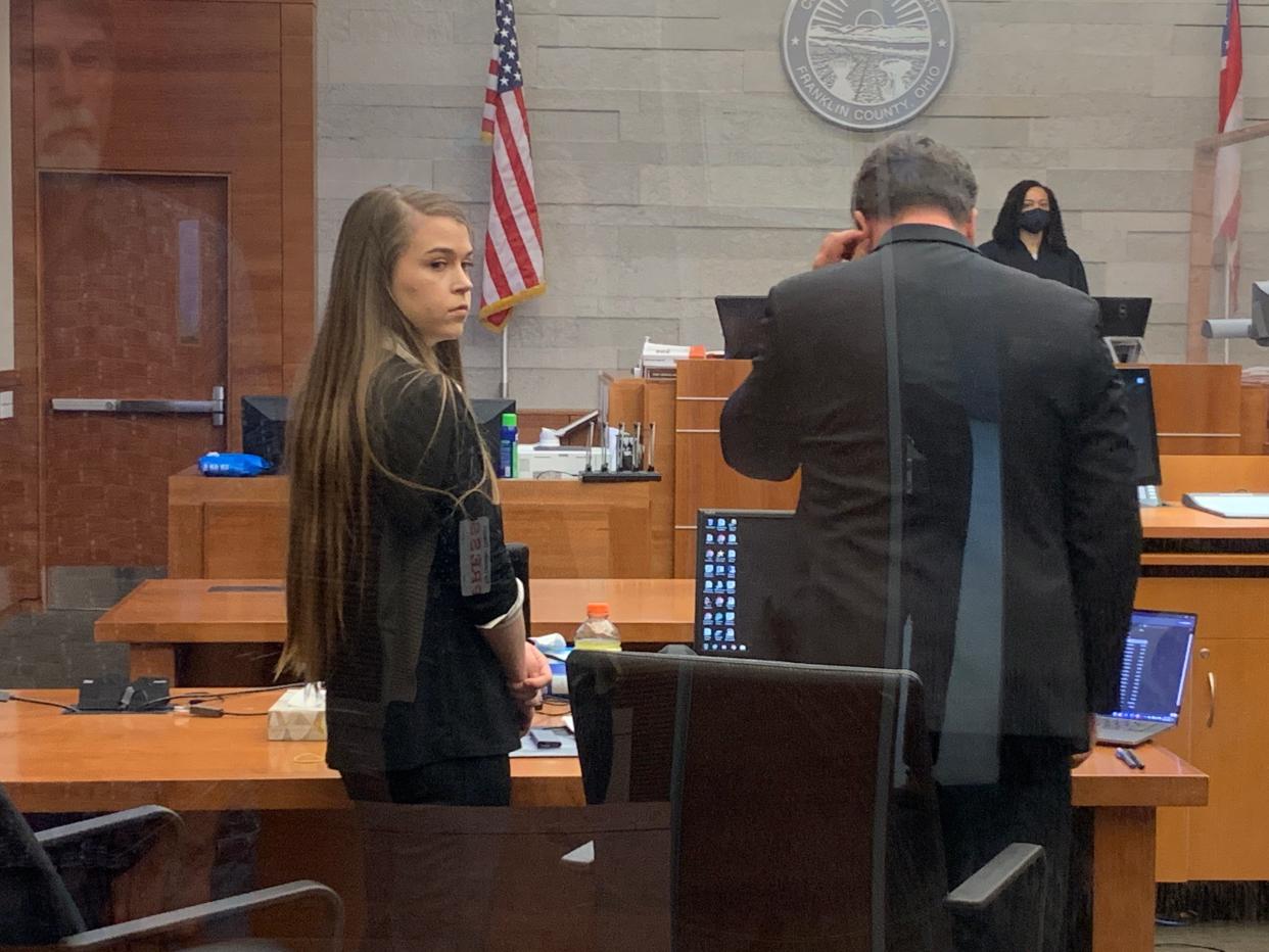 Samantha Stevens, 22, of Akron, and her defense attorney, Adam VanHo, on June 27 in Franklin County Common Pleas Court, where a jury announced Friday it could not decide whether she had fatally shot her allegedly abusive boyfriend in self-defense,