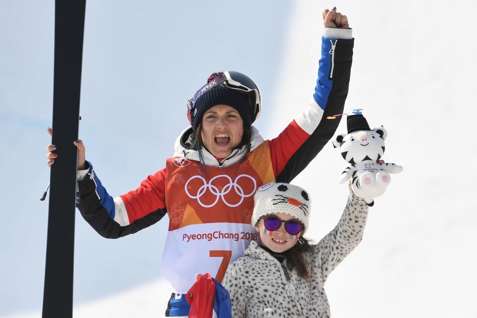 Marie Martinod and her daughter celebrate on the podium during the&nbsp;medal ceremony&nbsp;for the women's ski halfpipe final on&nbsp;Feb. 19.