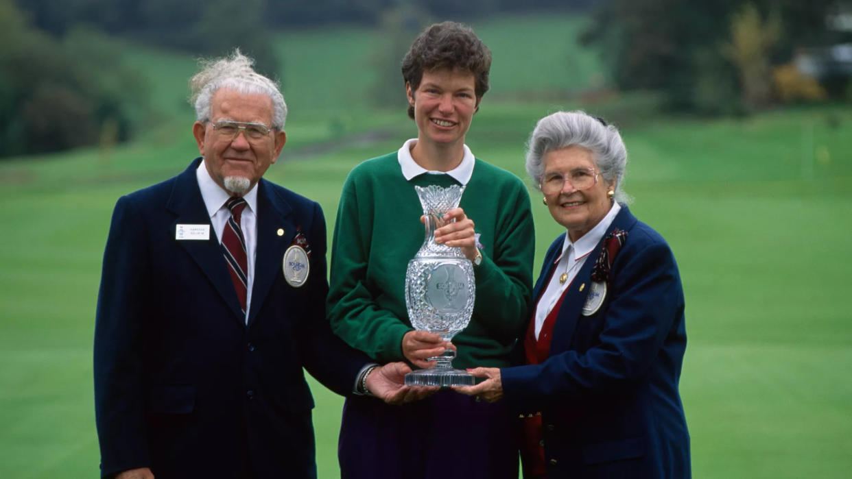  Karsten and Louise Solheim present European Captain Mickey Walker with the Solheim Cup in 1992 