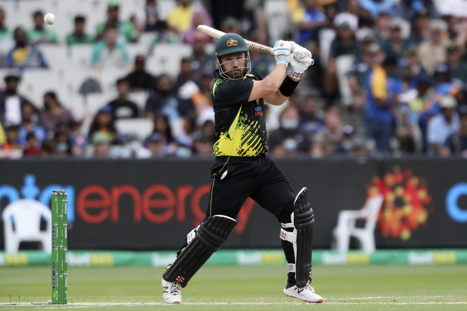 FILE - Australia's Aaron Finch bast against Sri Lanka during their T20 cricket match in Melbourne, Australia, Sunday, Feb. 20, 2022. Finch, Australia's men's T20 cricket captain, announced his retirement from all international cricket Tuesday, Feb. 7, 2023. (AP Photo/Asanka Brendon Ratnayake,File)