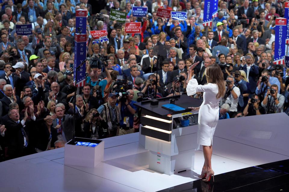 Melania Trump, wife of Republican Presidential Candidate Donald Trump waves to the delegates after her speech during the opening day of the Republican National Convention in Cleveland, Monday, July 18, 2016. (AP Photo/Mark J. Terrill)