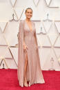 The Oscar winner and "Captain Marvel" star sparkled in a blush pink gown with a matching dramatic cape.